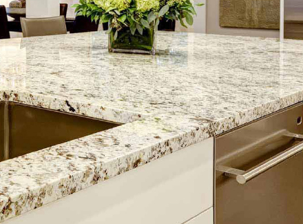 clean granite countertops on a kitchen island